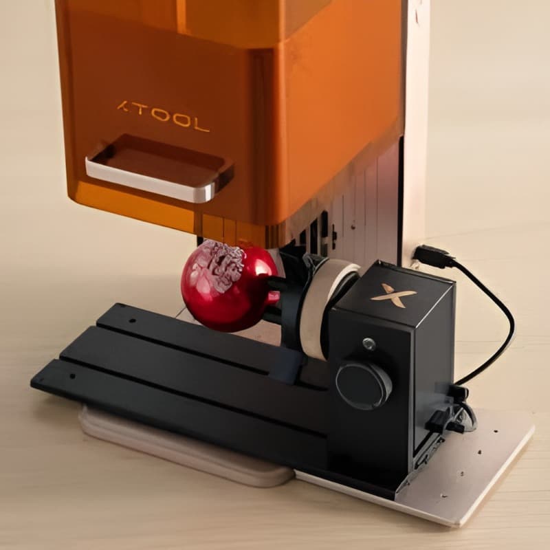 Craftsperson working on detailed wood engraving in studio