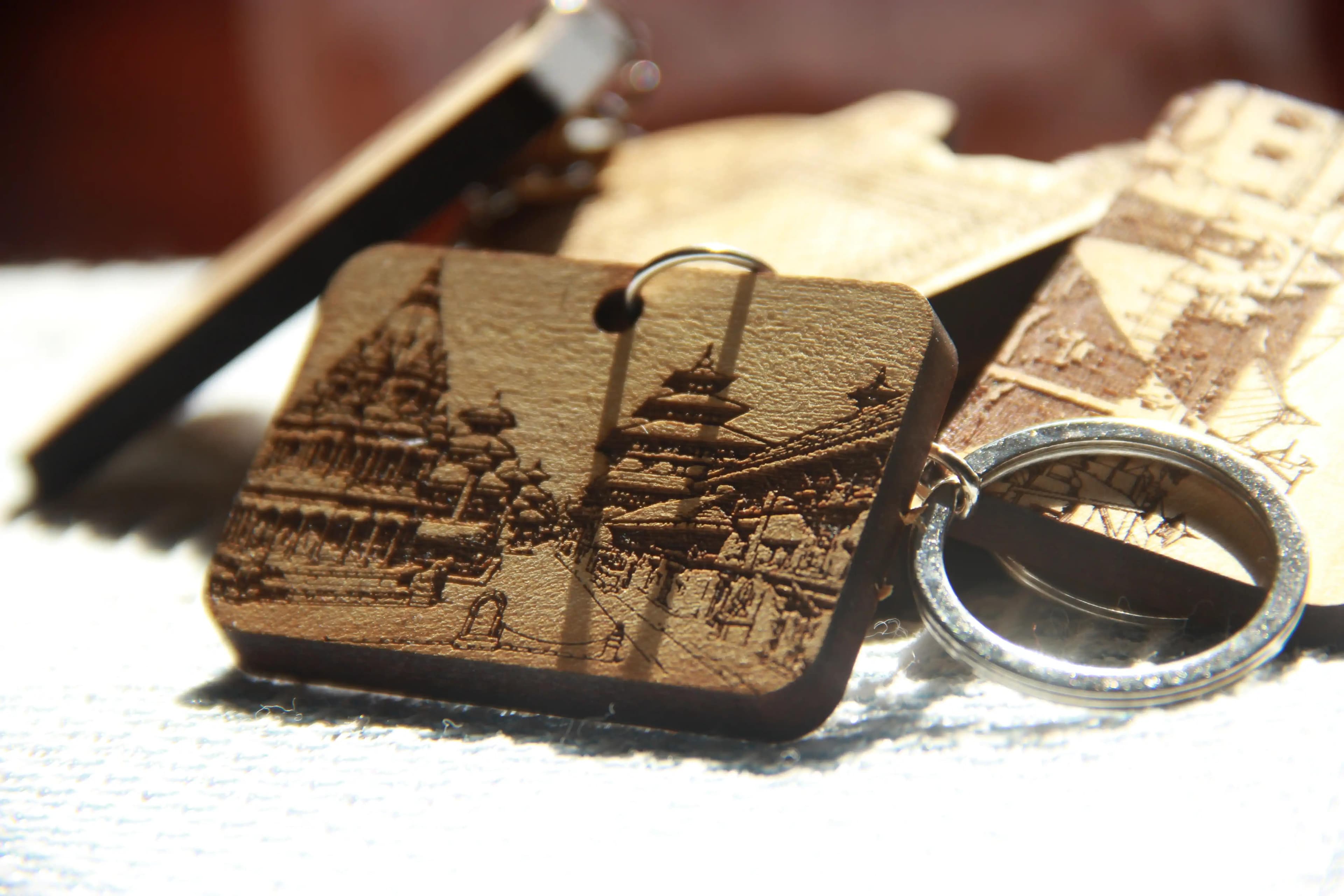 Handcrafted Krishna Mandir Keyring in engraved wood finish